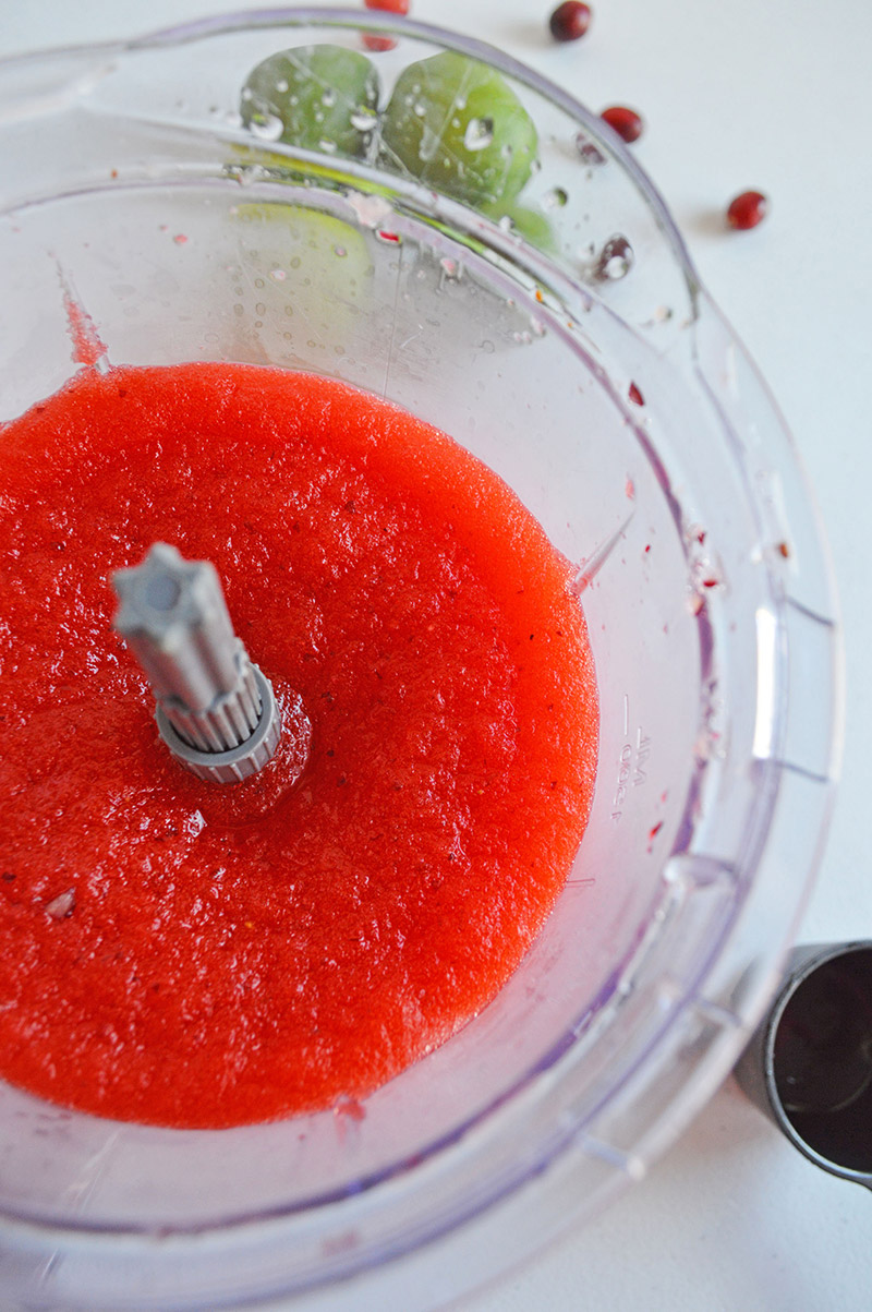red crushed ice in a blender