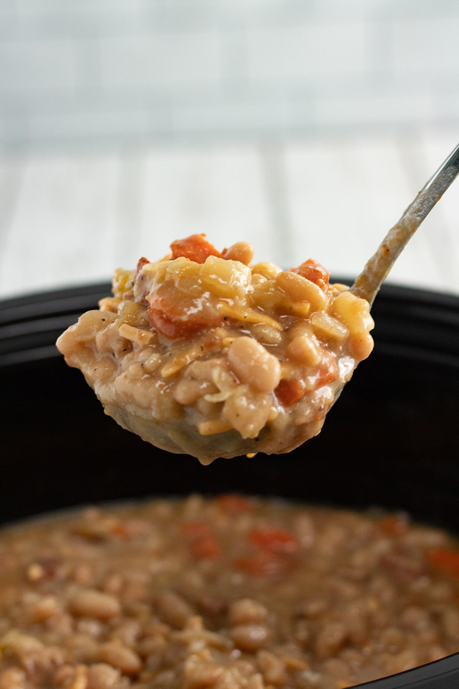 a ladle full of thick creamy soup