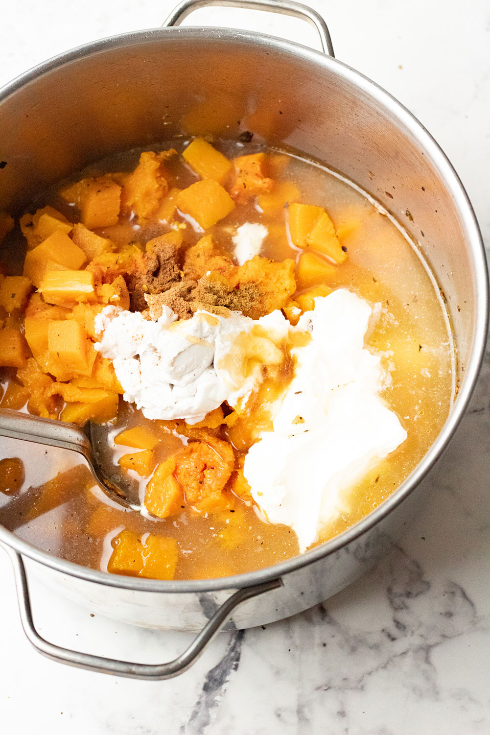 soup ingredients cooked in a pot. 