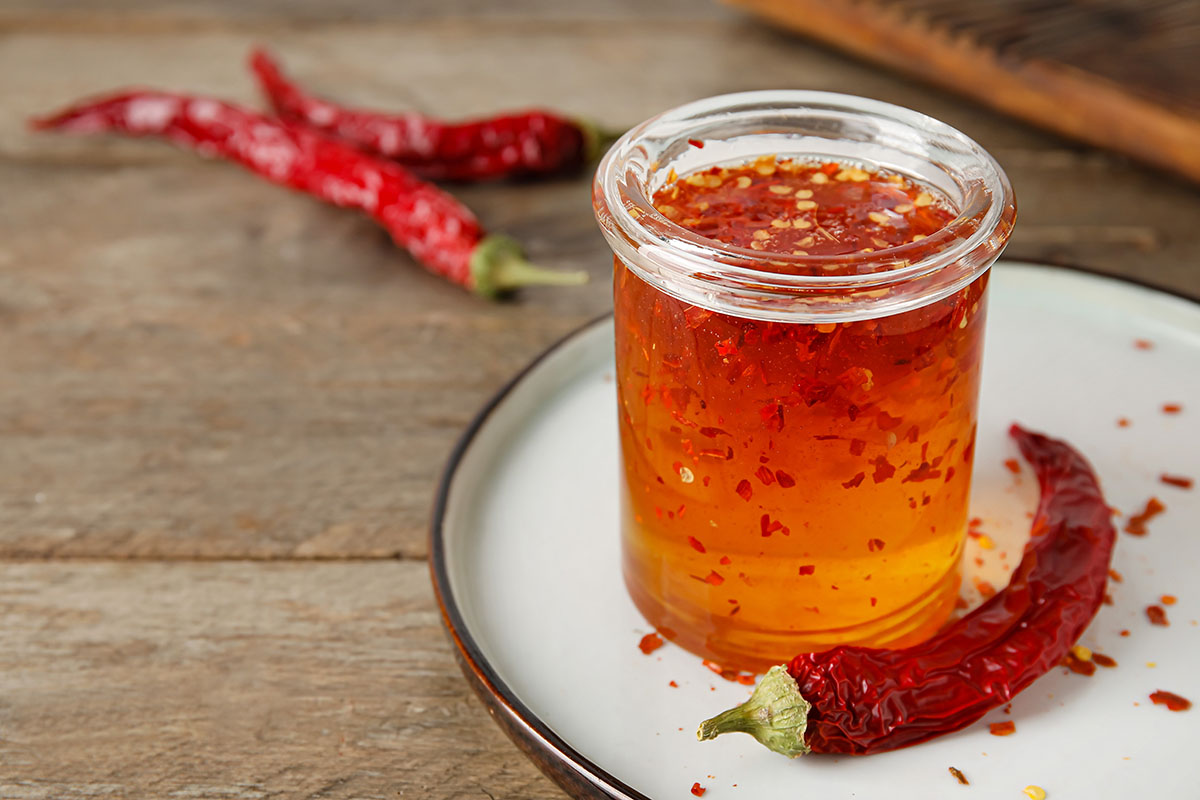 hot honey sauce in a glass jar.