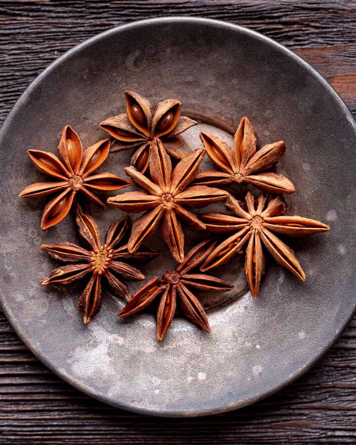 seven star anise on a plate.
