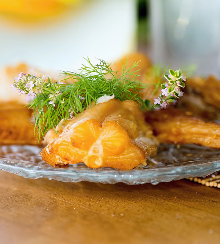 smoked cod fish fillets on a plate.