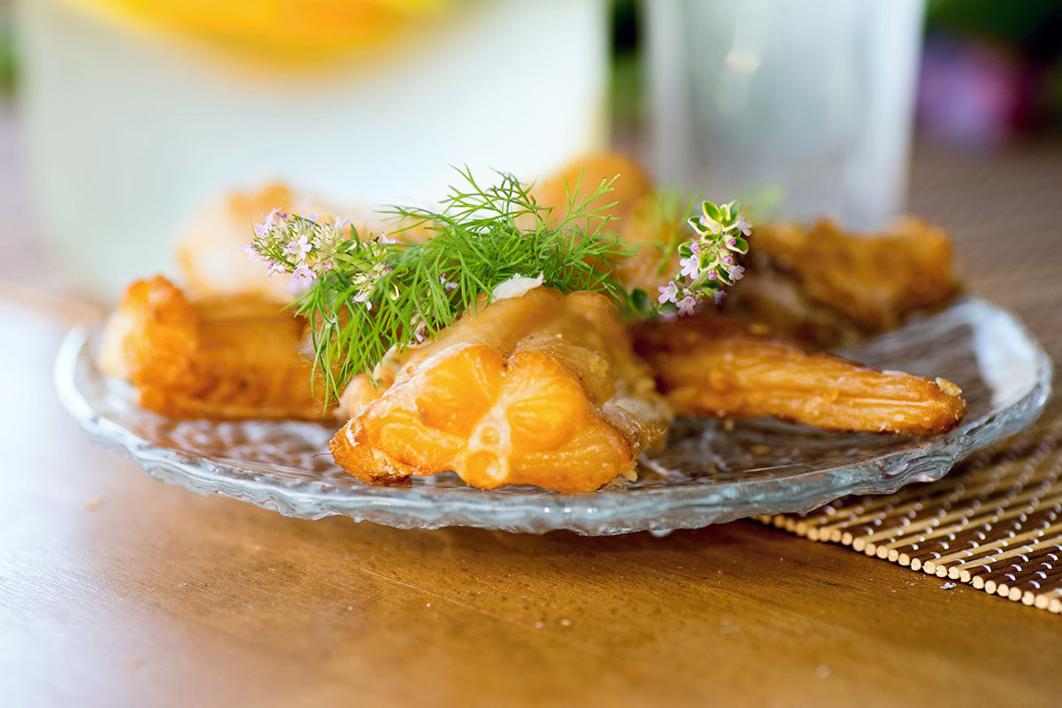 smoked cod fish fillets on a plate.