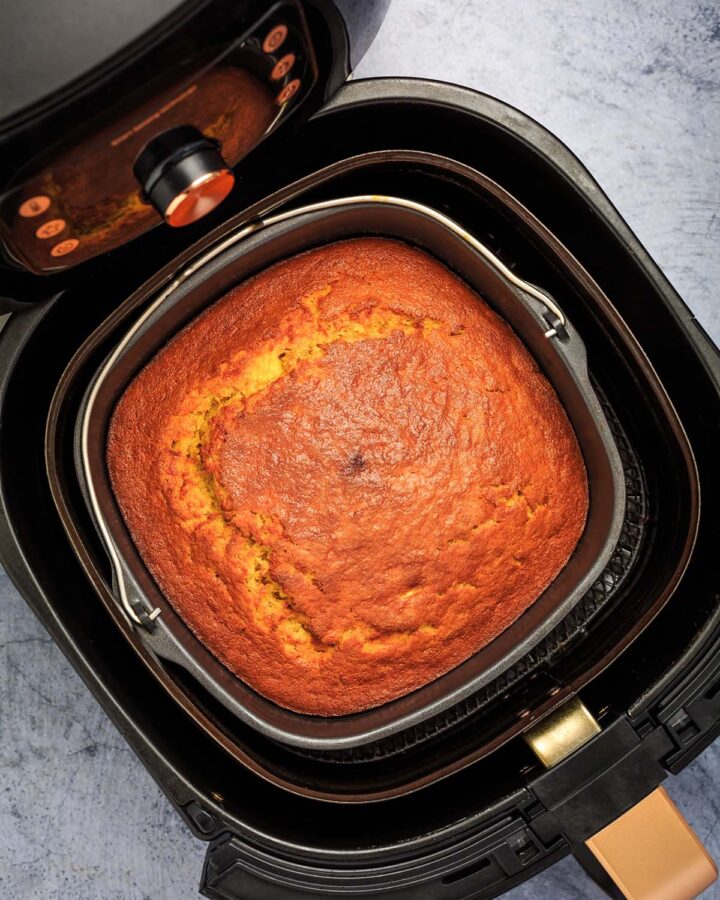 square cornbread in the air fryer basket.