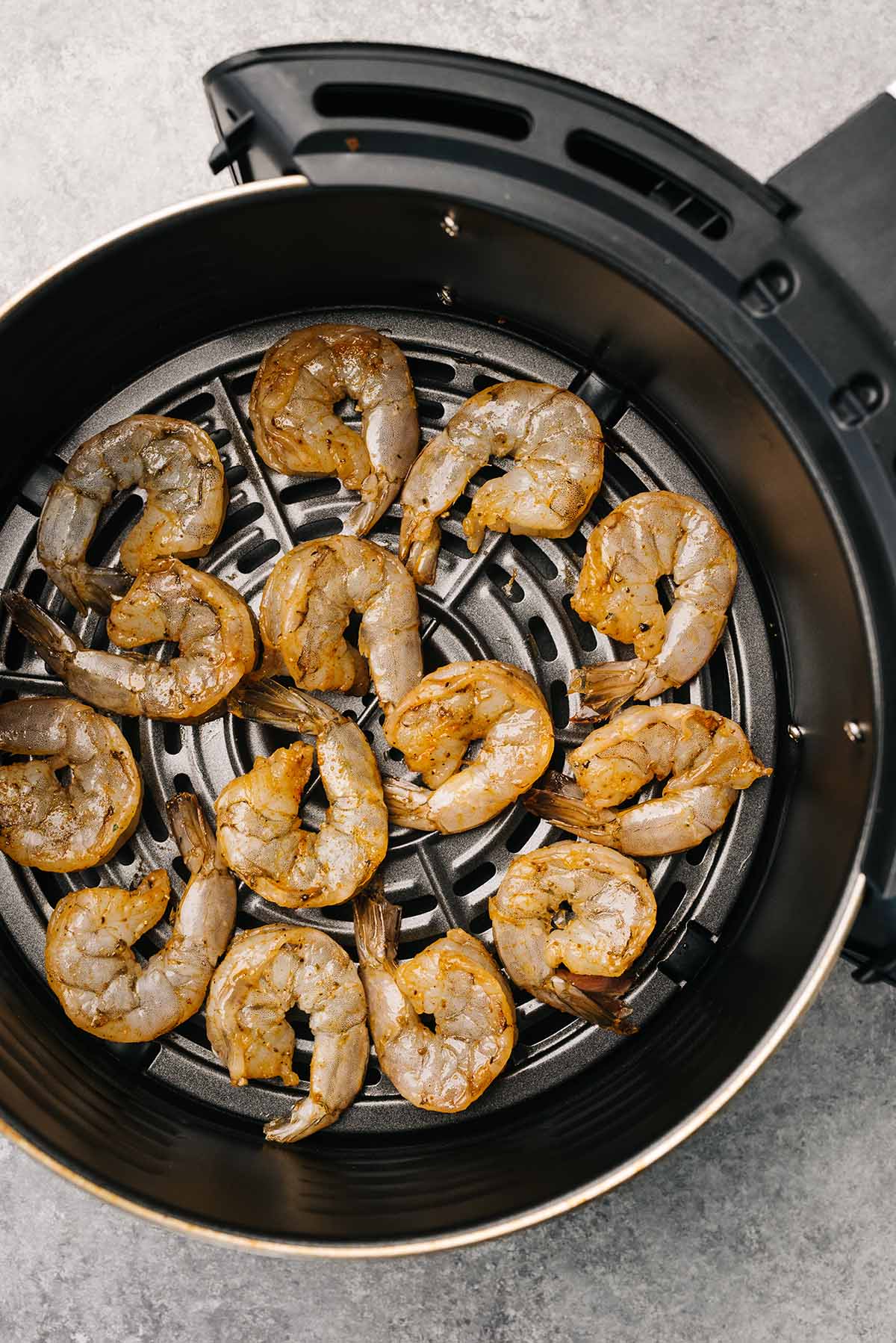 old bay shrimp in air fryer basket. 