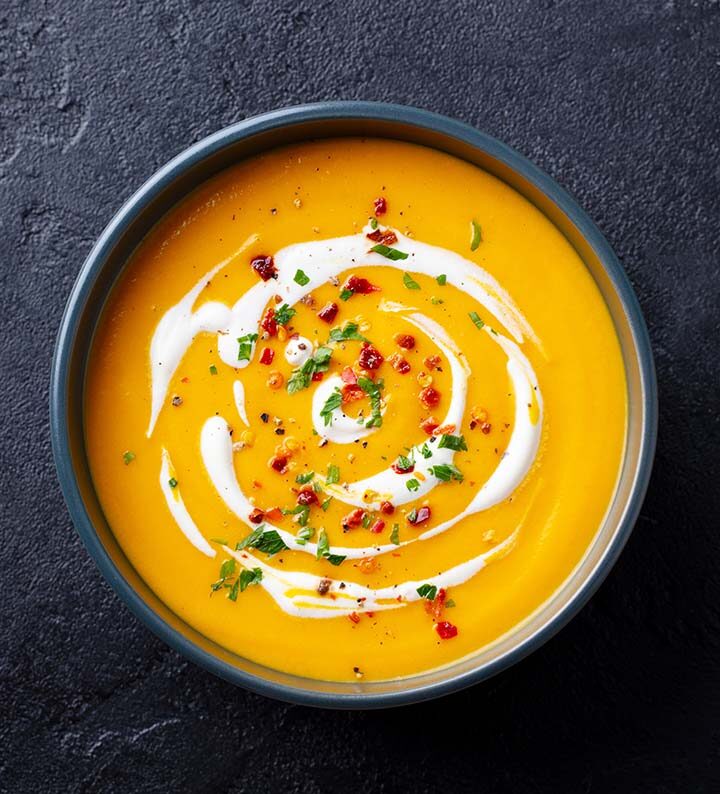 creamy butternut squash soup in a bowl.