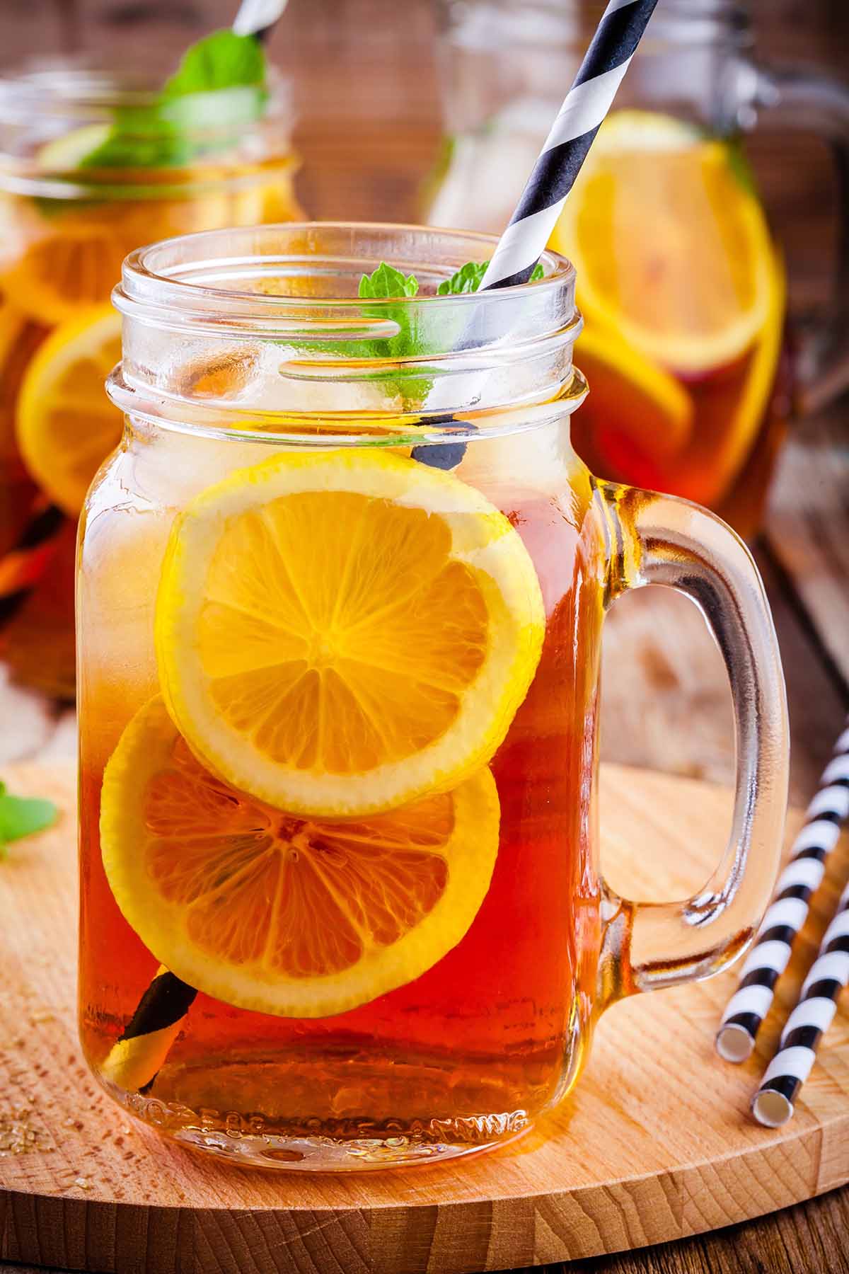 loaded tea with lemons and a straw.
