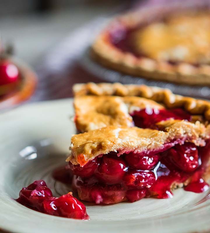 a slice of sour cherry pie.