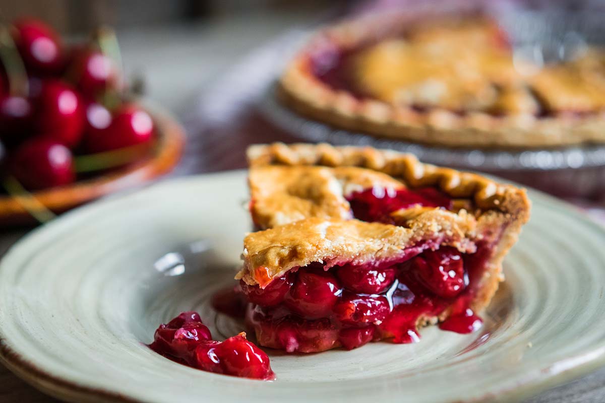 a slice of sour cherry pie.