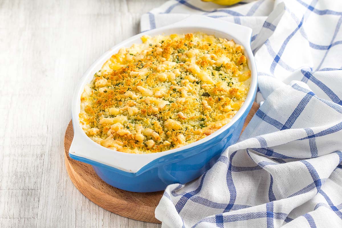 chicken casserole in a blue baking dish.