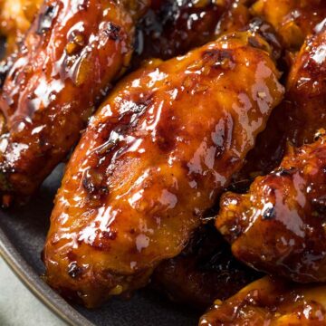 hot honey chicken wings in a bowl.