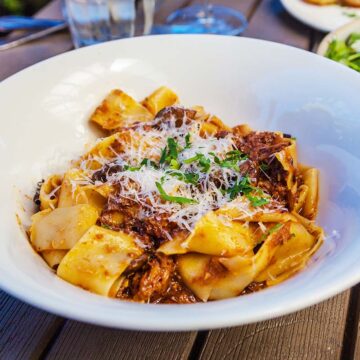 short rib pasta in a white plate.