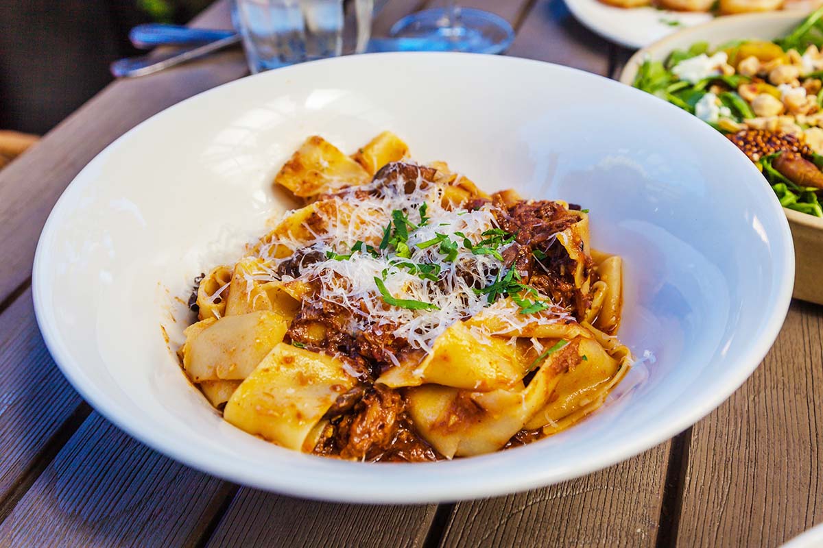 short rib pasta in a white plate.