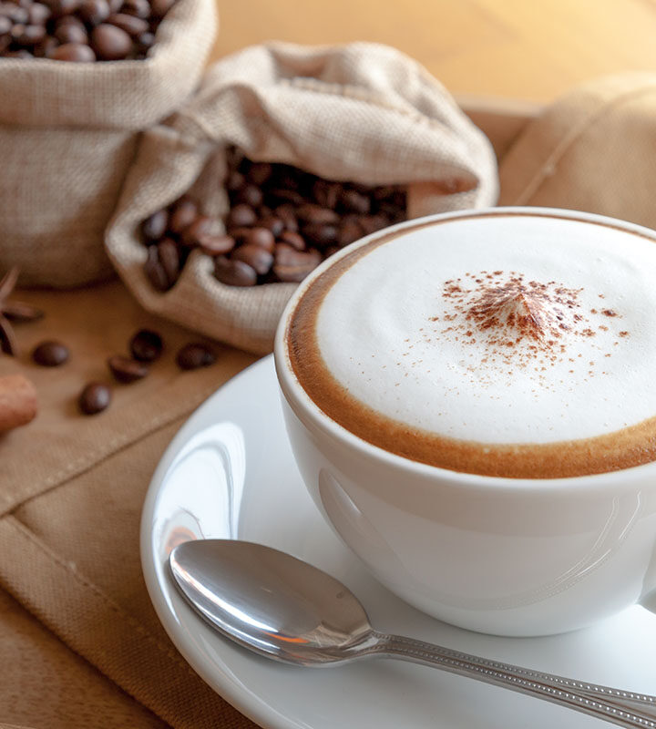 a nespresso cappuccino in a white cup.