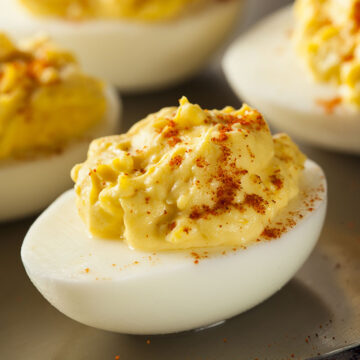 quail deviled eggs on a platter.