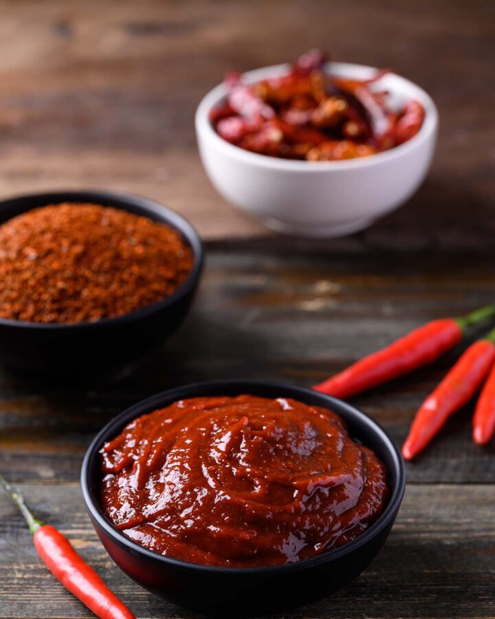 gochujang paste in a black bowl.