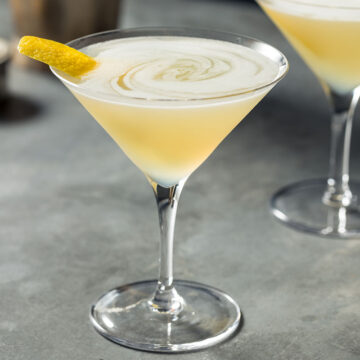 yellow cocktail in a martini glass.